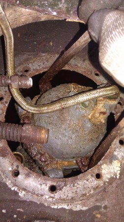 The fuel pump. Looks like a lead casing? The picture doesn't give the pump justice to its size.