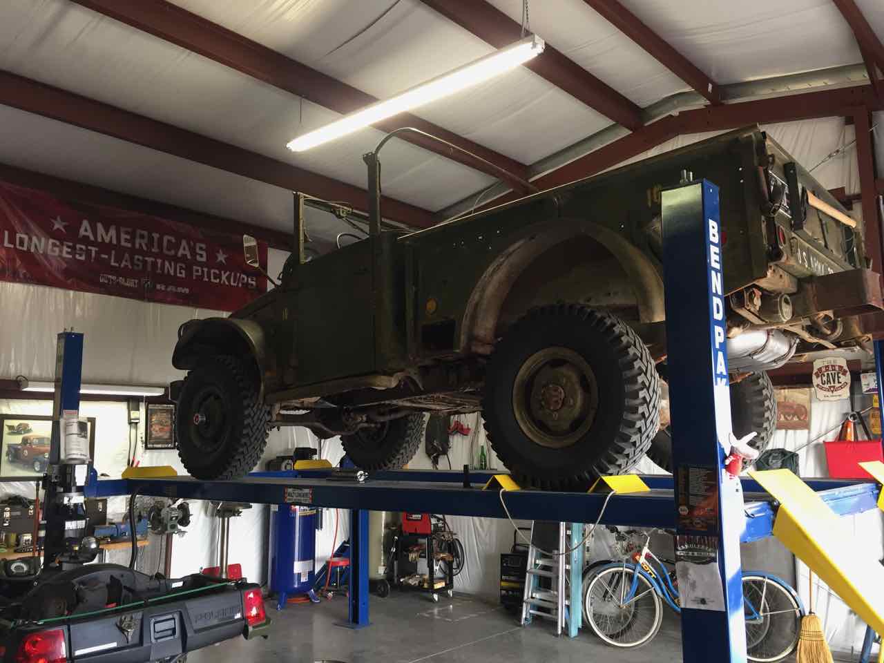 M37 on lift in garage.jpg