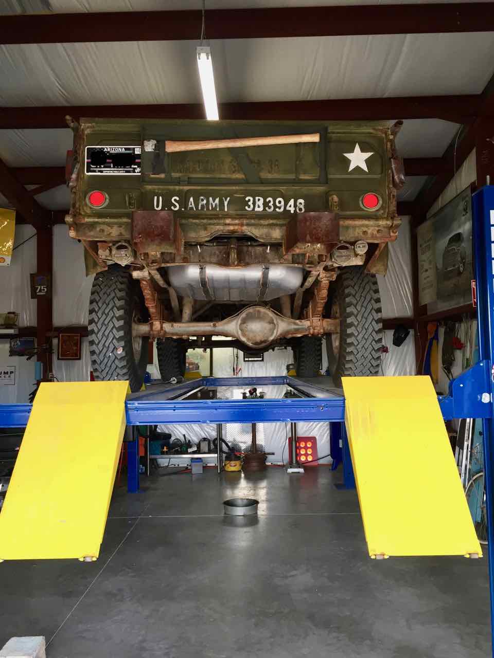 M37 on lift in garage.jpg