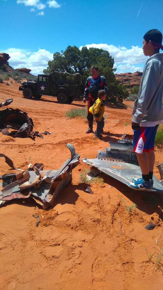 Canyon Lands Inspecting a Crashed Missle