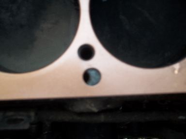 mis-aligned 230 head gasket hole.JPG